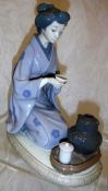 A Lladro figurine "The Tea Ceremony", No'd.