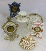 A collection of four porcelain bodied mantle clocks, assorted part tea wares,