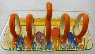 A Clarice Cliff four section "Crocus" pattern toast rack CONDITION REPORTS Some
