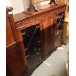 A modern mahogany glazed cabinet in the Victorian manner,