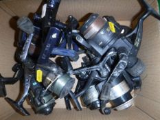 A collection of eight coarse fishing reels to include an ABU "Cardinal 40",