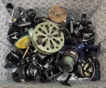 WITHDRAWN A collection of 30 assorted fishing reels to include 22 Intrepid reels of varying models,