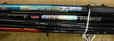 A collection of six assorted sea fishing rods to include beach casters, pier rods and spinning rods,