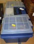 Two boxes containing an assortment of sea fishing tackle to include a large quantity of lures and