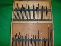 A collection of assorted fishing tackle to include a Hardy extending salmon gaff,