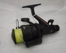 A Shimano "6010 Bait Runner" fixed spool reel and pouch
