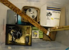 WITHDRAWN A collection of twelve boxed vintage fishing reels to include an Intrepid "Black Prince",