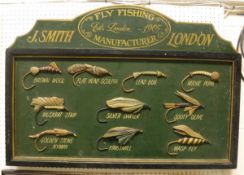 A "J Smith of London Fly Fishing Manufacturer" advertising board