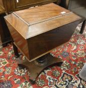 An early Victorian mahogany cellarette of sarcophagus form,