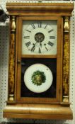 A 19th Century American oak cased drop dial wall clock