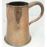 A 19th Century copper jug of large proportions,