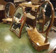 A circa 1900 walnut framed easel dressing mirror with bevelled edged plate,