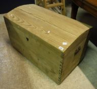 A pine dome top chest together with a pine blanket box