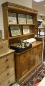 A pine dresser with two tier plate rack,