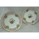 A pair of Meissen cabinet plates, with central basketwork ground,
