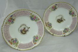 A pair of Meissen cabinet plates, with central basketwork ground,