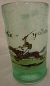 A green bubble glass vase or beaker with painted decoration depicting a racehorse and jockey