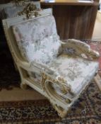 A pair of silik lo stile di classe cream painted and gilded open armchairs in the 18th Century