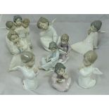 A collection of twelve assorted Lladro figurines to include eight cherubs,