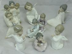 A collection of twelve assorted Lladro figurines to include eight cherubs,