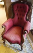 A rosewood framed armchair back with red button back upholstery and carved cabriole front legs to