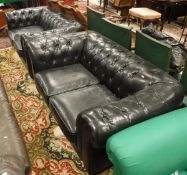 A pair of modern black leather Chesterfield two seat sofas CONDITION REPORTS