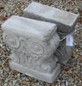 A pair of composite stone bench bases