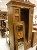A late 19th/early 20th Century ash wardrobe and matching dressing chest,