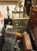 A box containing a glass and brass hall lamp, various cameras,