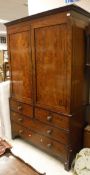 A 19th Century mahogany linen press with inlaid decoration,