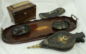 A Victorian rosewood tea caddy of sarcophagus form,