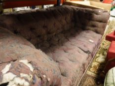 WITHDRAWN A Victorian Chesterfield sofa on squat bun feet