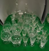 A quantity of various cut glassware to include three decanters, two water jugs,