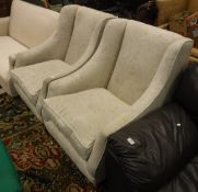 A pair of modern Laura Ashley cream floral upholstered sweat armchairs on squared tapered beech
