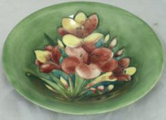 A Moorcroft green ground floral decorated shallow bowl CONDITION REPORTS Condition
