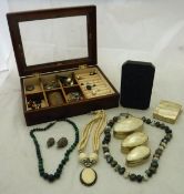 A box of assorted costume jewellery to include various amethyst,