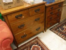 A stained teak chest of drawers,