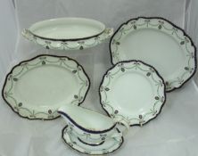 An Edwardian Royal Worcester "Vitreous" part dinner service with harebell swag and ribbon