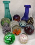 A collection of ten various glass paperweights including Caithness "Hot, Hot, Hot",