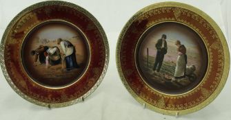 A pair of Vienna cabinet plates printed with decoration depicting figures harvesting