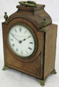 A 19th Century mahogany cased mantle clock, retailed by Manoah Rhodes & Sons Ltd of Bradford,