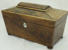 A Regency rosewood tea caddy of sarcophagus form