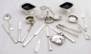 A small collection of various silver plated items to include sifter spoon, tea strainer,