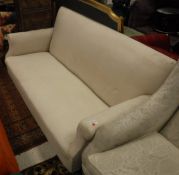 A three seat sofa on turned mahogany feet CONDITION REPORTS Condition dirty, tired.