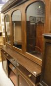 A mahogany bookcase cabinet in the Victorian taste,