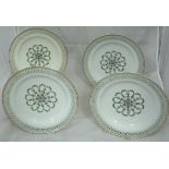 A set of four Berlin porcelain cabinet plates with central floral and foliate medallion decoration,