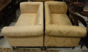 A pair of modern scroll arm two seat sofas,
