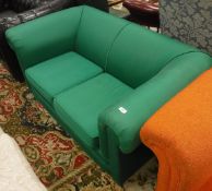 A modern green upholstered two seat Chesterfield type scroll arm sofa