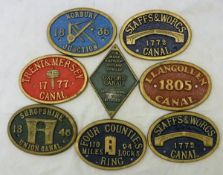 A selection of eight various painted brass canal badges/plaques inscribed variously to include