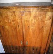 A 19th Century Biedermeier style walnut kas or armoire,